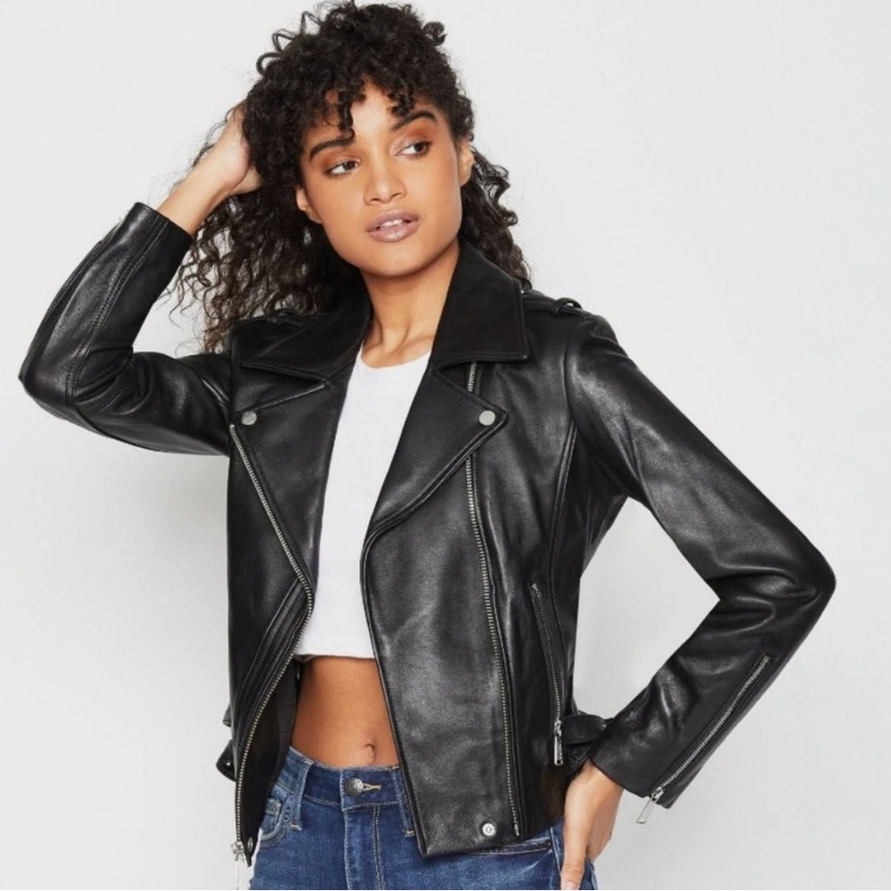 BCBG Moto Jacket.Gently Used.Missing a small grommet.Zippers pockets look great